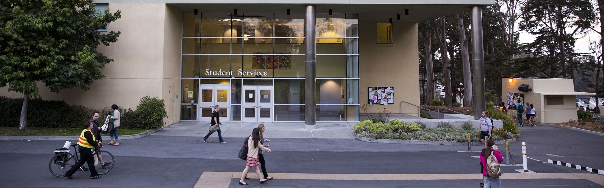 Student Services Building with students walking outside